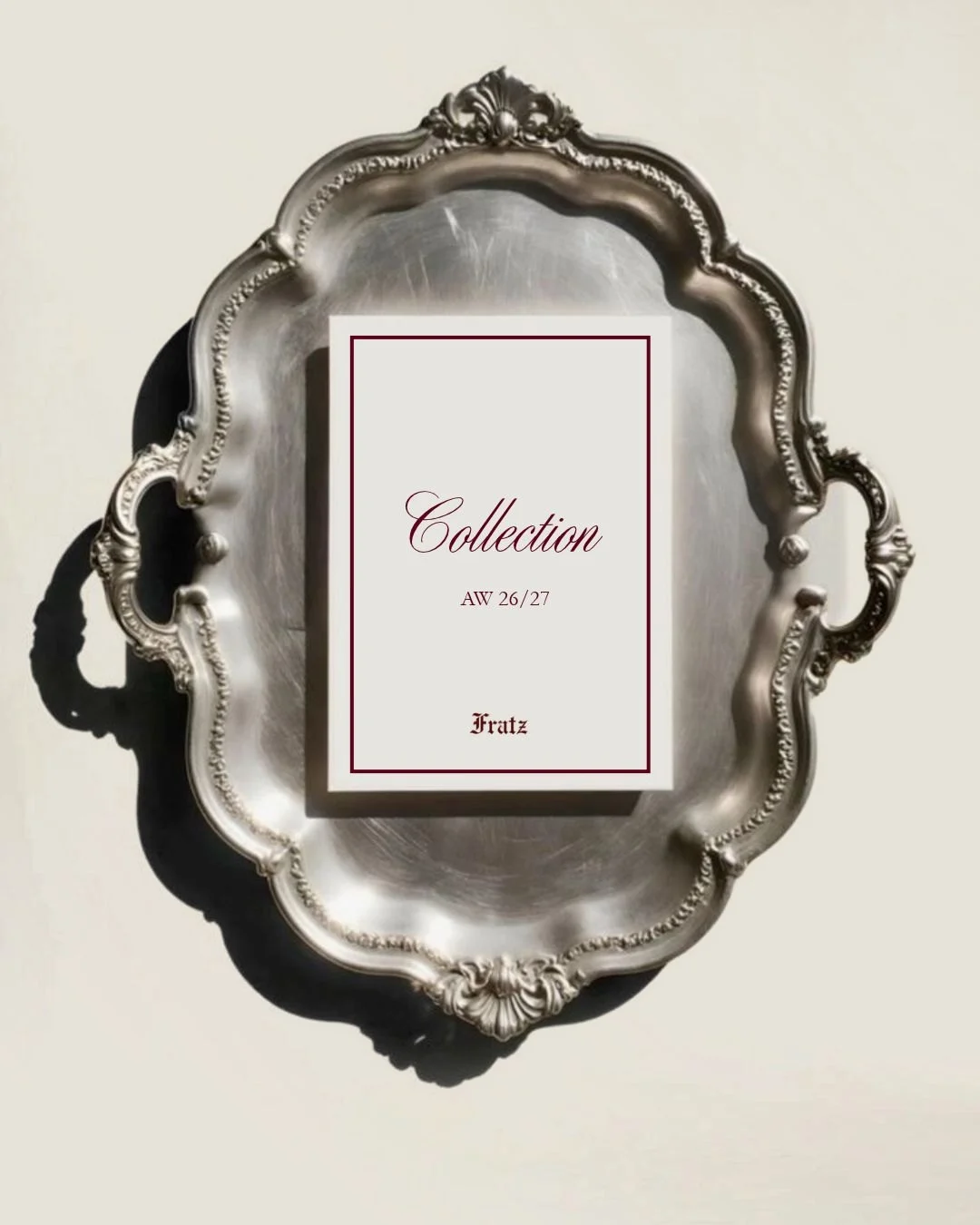 The AW 26/27 collection card served on a silver tray